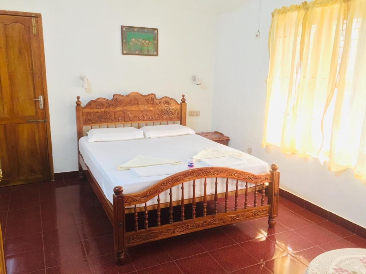 Ganesh House Homestay Kovalam Bagian luar foto